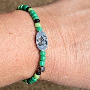 Endangered Widlife Trust green stretchy bracelet support animals